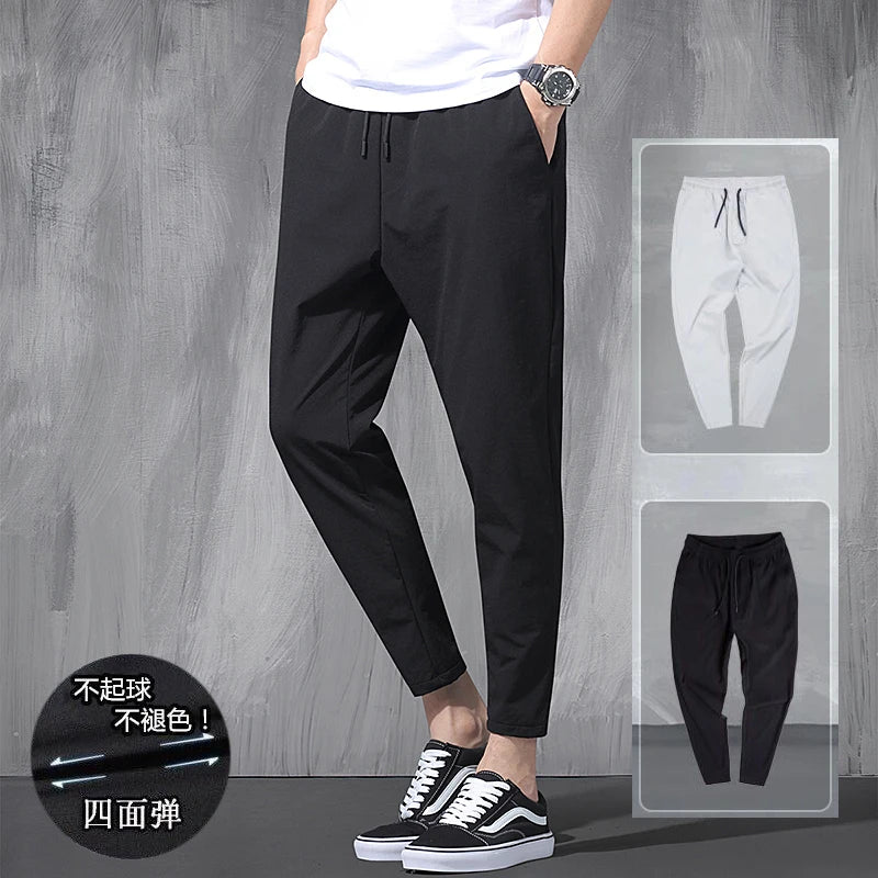 2024 New Korean Ice Silk Elastic Trousers Four Seasons Thin Casual Men'S Loose 9-Point Large Size Small Foot Sports Pants Spring